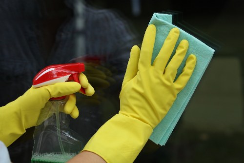 Carpet cleaning team preparing safe equipment and protective measures